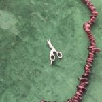 The Scissors represent a need to cut ties with something or someone