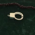 The Handcuff represents attachments that hold us back 